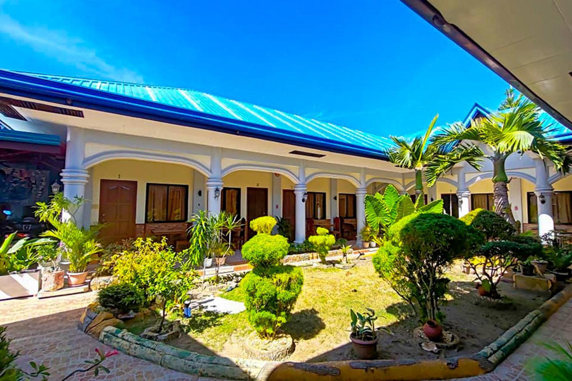 פורטו פרינססה Mbg Travellers Inn Powered By Cocotel מראה חיצוני תמונה